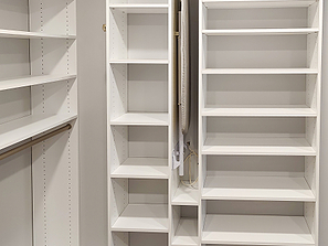 Section of diy custom closet with wide and narrow shelves