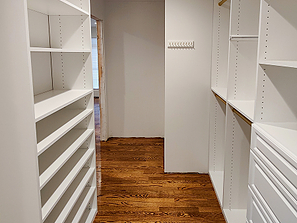Walk in closet of diy custom shelves and drawers